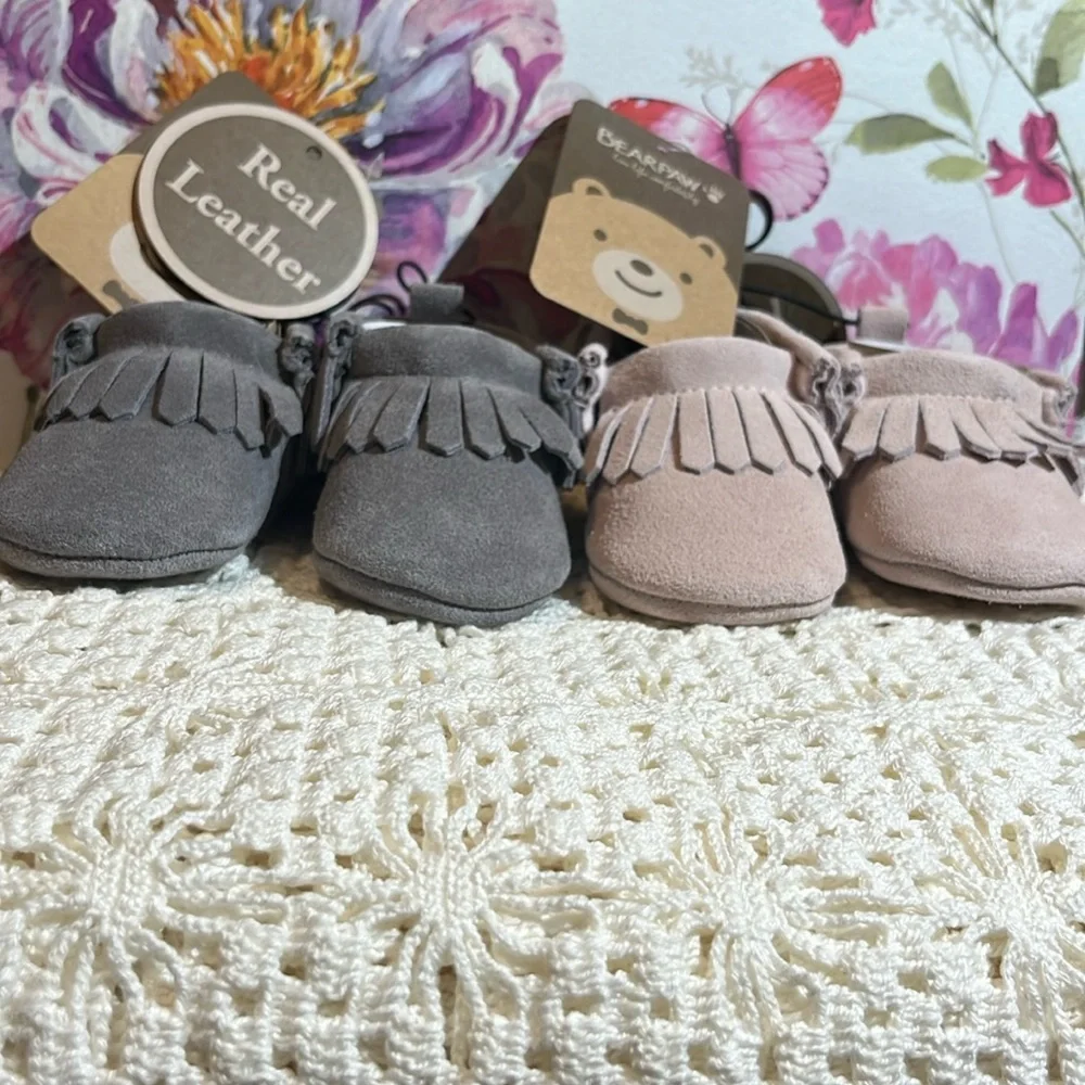 NIB BEARPAW CRIB SHOES. SZ 0/6 mo………3 pairs. **SOLD SEPARATELY** - Picture 1 of 5